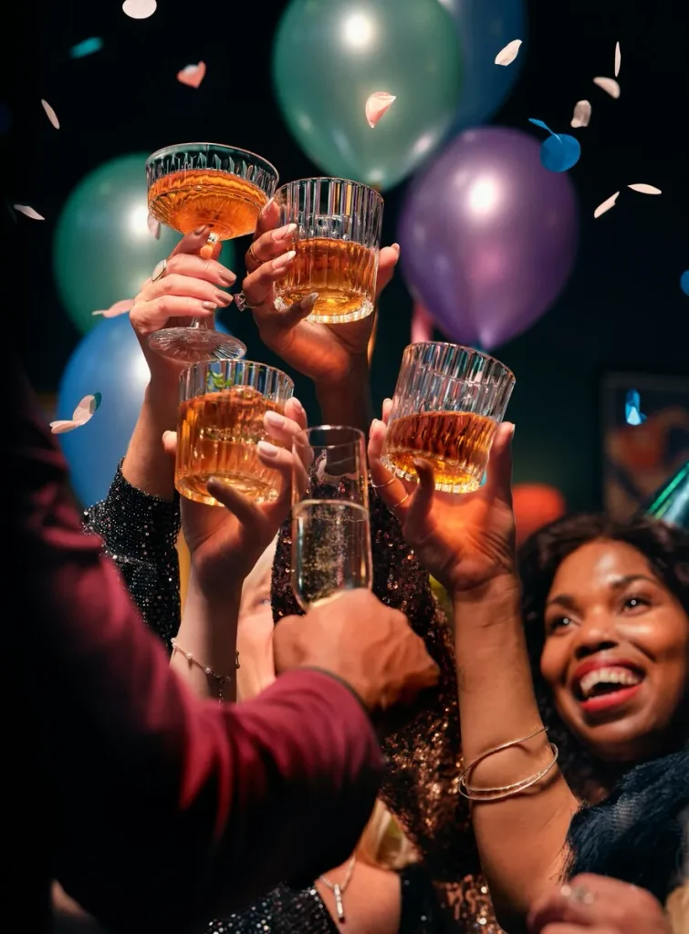 Alcohol glasses and bottles representing the role of alcohol in family and social life