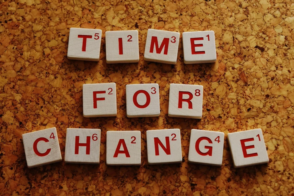 exam time decorative image reading on scrabble pieces says: time for change.